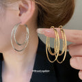 Gold Tone Triple Layer Hoop Geometric Statement Earrings view 1