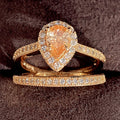 Pear-Shaped Solitaire Halo Two-Ring Set In Two Metal Tones view 4