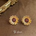 Gold Tone Sunflower Stud Earrings With Burgundy Glitter Round Centers view 1