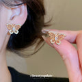 Gold Tone Openwork Butterfly Stud Earrings with Clear Crystals view 2