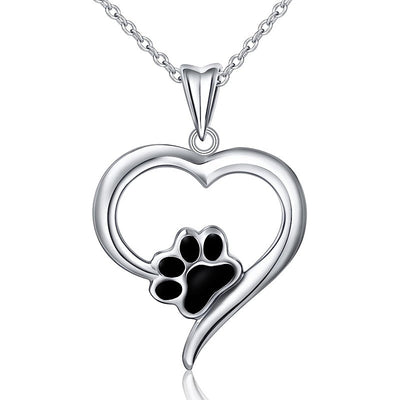 Front product view of silver tone heart and black paw print pendant necklace