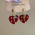 Gold Tone Crystal Heart Drop Huggie Earrings in Two Colors view 7