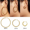 Gold Tone Twisted Hoop Earrings in Three Diameter Options view 1