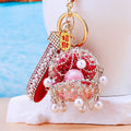 Jeweled Treasure Shell Keychains in Luxury Pearl and Gemstone Orb Styles view 3