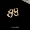 Two Tone Interlocking Oval Huggie Hoop Polished Metal Polished Metal Earrings view 2
