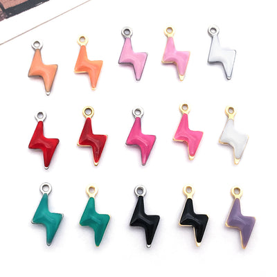 Colorful bell charms arranged on a light background