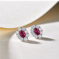 Red Oval Solitaire Halo Stud Earrings In Silver Tone view 5
