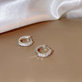 Small Silver Tone Crystal Row Huggie Hoop Earrings view 2