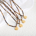 Tiger Eye Tube Bead Necklace Gold Sun Pendant Charm view 2