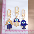 Gold and Silver Tone Crystal Hamsa Evil Eye Clip Keychains in Six Styles view 5
