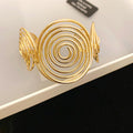Spiral Disk And Organic Loop Open Cuffs In Gold Or Silver Tone view 6