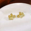 Gold Tone Folded Five Petal Sculptural Flower Stud Earrings view 2