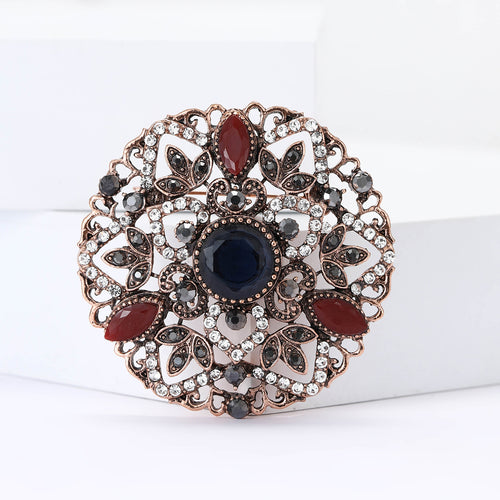 Angled display of Vintage Round Floral brooch