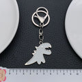 White and Black Tyrannosaur Enamel Keychains, 2 Colors view 3