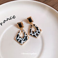 Black and White Geometric Drop Earrings with Gold Tone Frames view 2