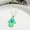 Gold Tone Hamsa Evil Eye Pendant Necklaces in Nine Colors view 10
