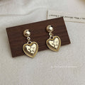 Gold Ball Stud Earrings Heart Drop Raised Star Center view 3
