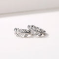 White Gold Leaf Branch Huggie Hoop Earrings Polished Metal view 4