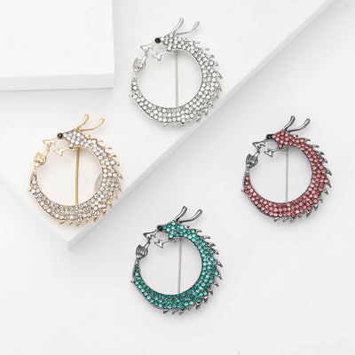 Circular Tail Chasing Dragon Brooch in Four Colors displayed from the front