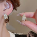 Gold Tone Crystal Arch Stud Earrings With Pearl Rows view 1