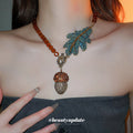 Amber Bead Necklace Teal Leaf Acorn Rhinestone Toggle view 2