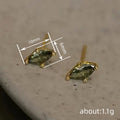 Green Marquise Solitaire Stud Earrings In Gold And Silver Tones view 4