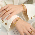 Double Wire Knot Open Cuff Bangle And Matching Knot Ring view 1