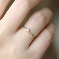 Minimal Oval Clear Solitaire Slim Ring In Polished Gold Tone view 2