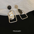 Gold Tone Black and White Asymmetric Geometric Earrings view 4