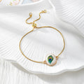 Gold Tone Peacock Feather Evil Eye Slider Bracelets in Nine Shapes view 2