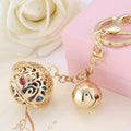 Hollow Palace Bell Keychains in Gold and Silver Tone Finishes view 3