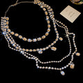 Silver Tone Layered Crystal Necklace with Geometric Drops view 6