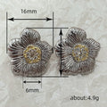 Two Tone Sculpted Flower Stud Earrings With Yellow Centers view 4