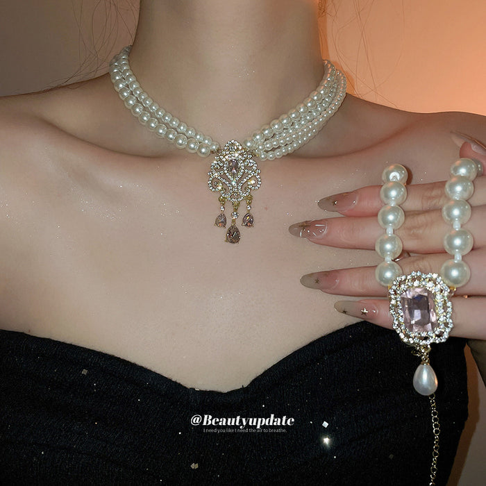 Layered Pearl Choker Necklace with Ornate Pink Crystal Pendant