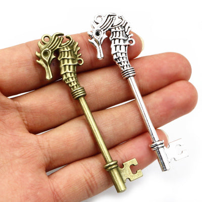 Seahorse and Key Shaped Pendants in Two Antique Tone Finishes — grouped product view