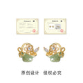 Gold Tone Green Basket Flower And Bow Stud Earrings For Women view 3