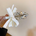 Crystal Bow Duckbill Hair Clip In Pink Or White With Teardrop Fringe view 7