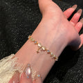 Gold Bow Crystal Slider Bracelet With Star Charm Accent view 2
