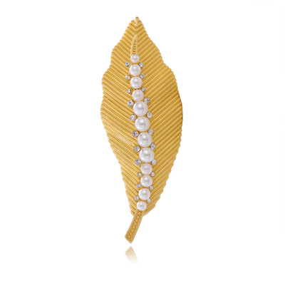 Front view of the gold leaf metal brooch
