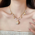 Coastal Shell and Starfish Charm Necklace with Pearl Accents view 3