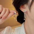 Gold Tone Butterfly and Pearl Chain Drop Earrings Fashion Jewelry view 1