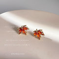 Gold Tone Red Orange Faceted Stone Maple Leaf Stud Earrings view 3