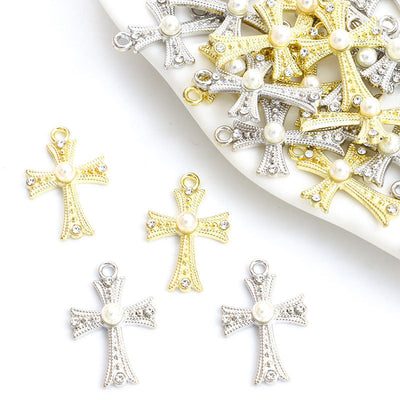 Front assortment of slender cross silhouettes lined with clear crystals