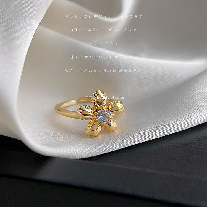 Gold Tone Wavy Floral Braided And Clear Stone Rings In Three Styles