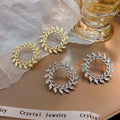 Gold and Silver Open Leaf Wreath Round Stud Earrings view 1