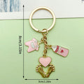 Baby Shower Charm Keychains Featuring Blue Lollipop Bottle Across 14 Pictured Variations view 7