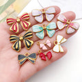 Gold-Tone Bow and Butterfly Metal Charms with 16 Listed Options view 4