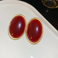 Gold Tone Oval Resin Stud Earrings in Black and Burgundy view 7