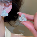 Crystal Flower Pearl Clip-On Stud Earrings with Polished Metal Details view 3