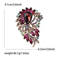 Oval Gem Feather Brooch In Eight Colorways With Polished Metal Detail view 12
